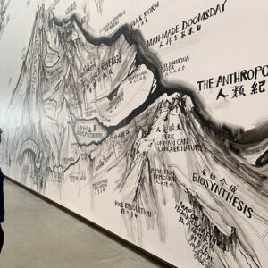 man looking at art gallery installation
