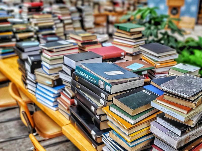stacks of library books